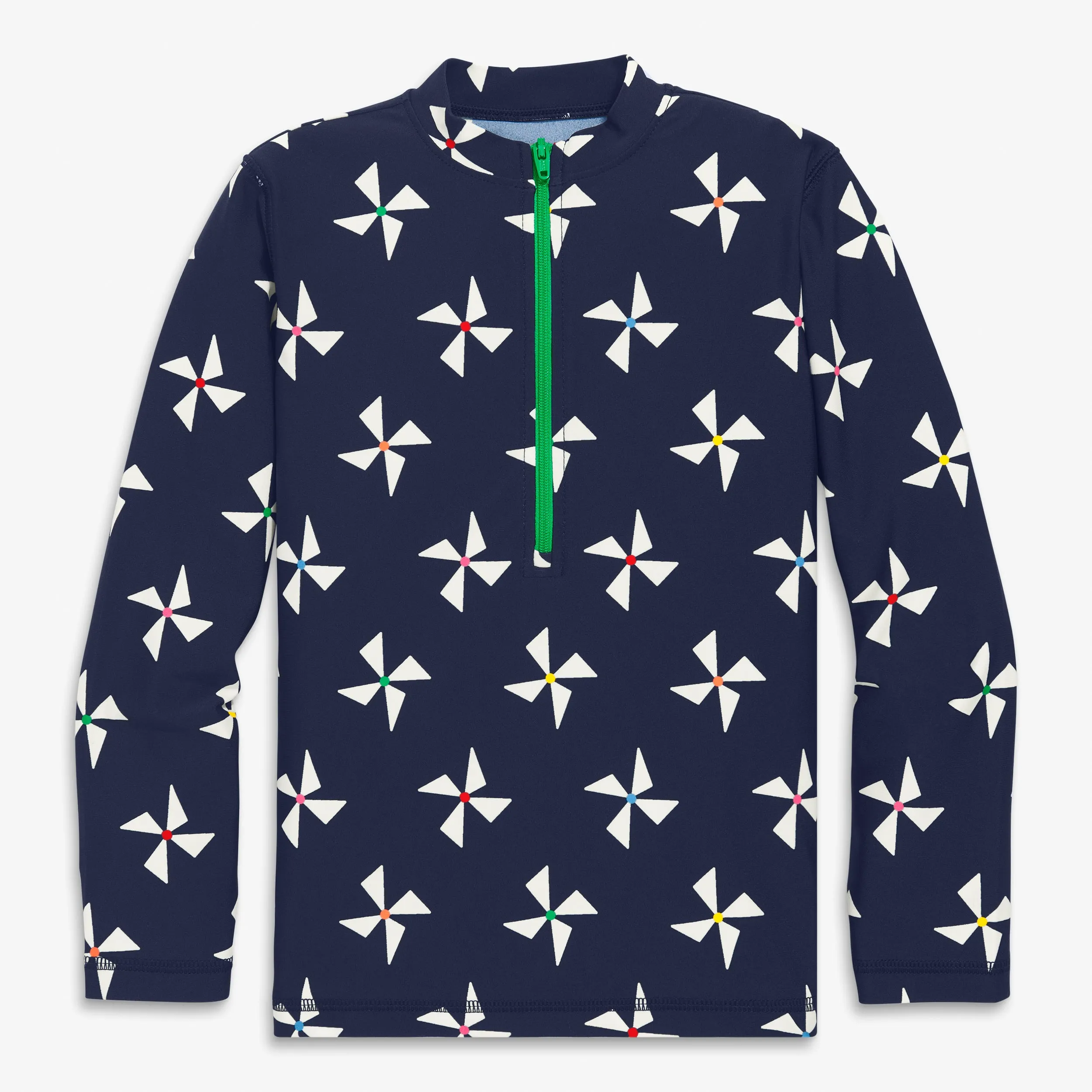 Long sleeve half-zip rash guard in rainbow pinwheels